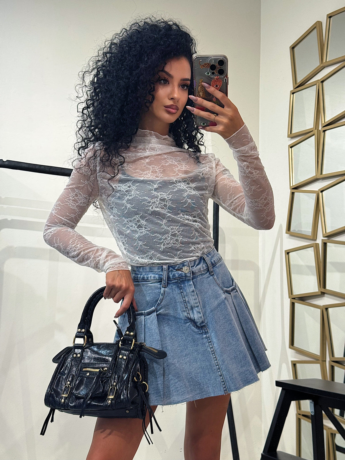 Maglia in pizzo collo alto
