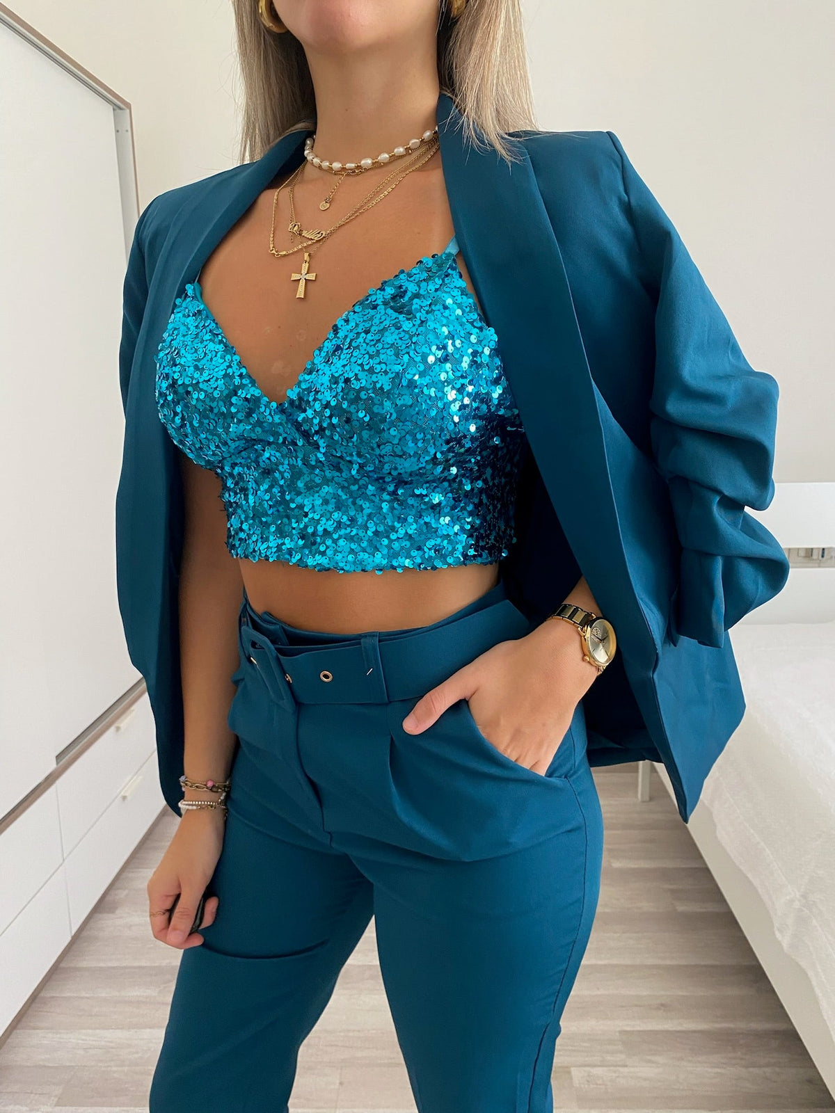 Top con paillettes petrolio