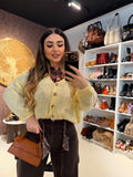 Cardigan giallo con bottoncini oro