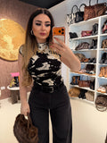 Completo top e pantalone cow print