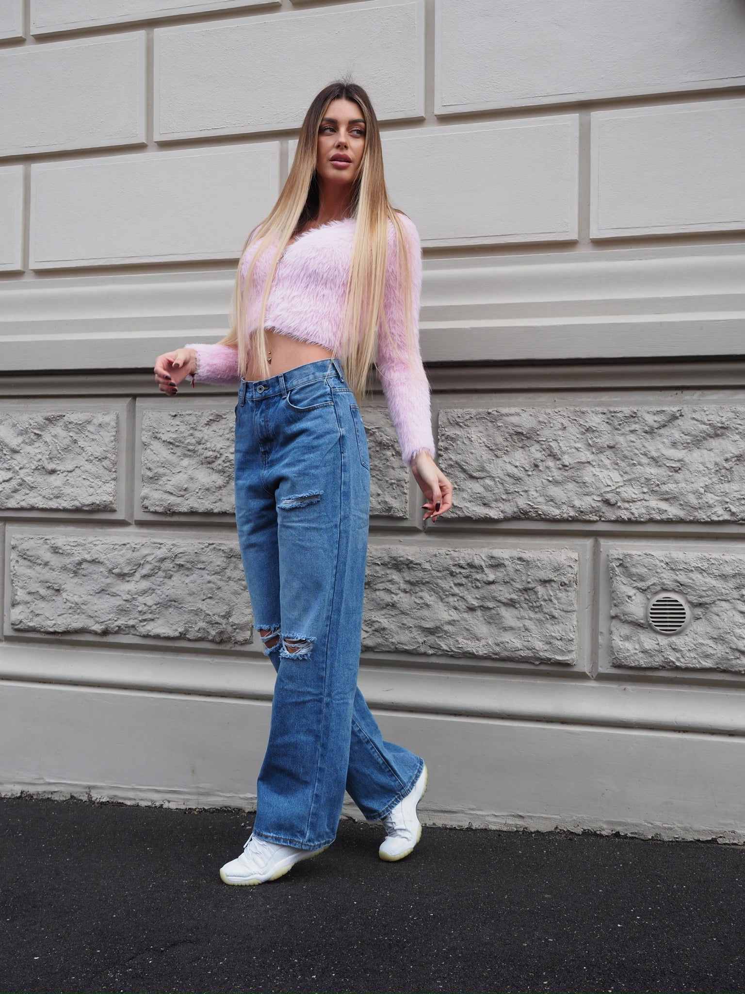 Jeans vita bassa con strappi