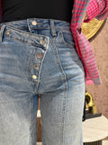 Jeans taglio obliquo