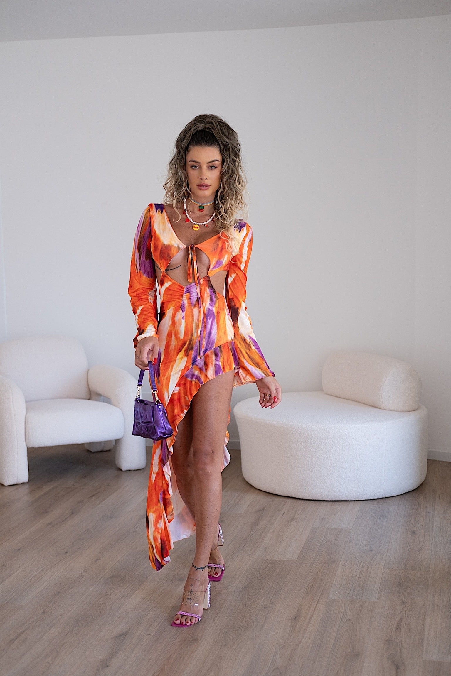 Abito asimmetrico arancio viola