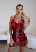Abito rosso con fiori e rouches