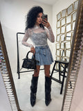 Maglia in pizzo collo alto