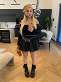 Maglioncino a trecce nero