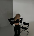 Due pezzi top e pantalone nero
