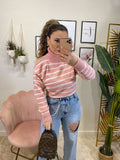 Pull rosa spalla aperta e perle