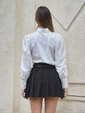Camicia con strass e arricciatura