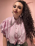 Camicetta con strass al collo e righe