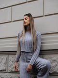 Completo maglia e pantalone grigio a righe