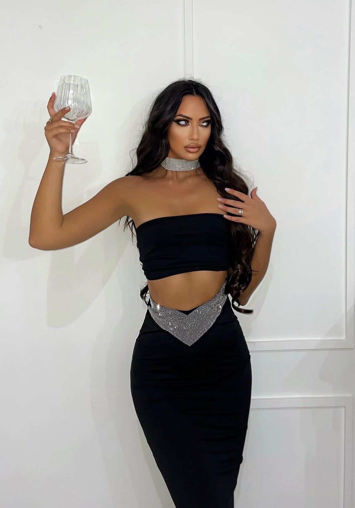 Completo top e gonna nero con strass
