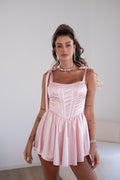 Abito bustier rosa con fiocchetti