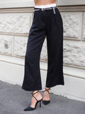Pantalone nero con dettaglio bianco