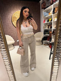 Jeans con bandana in pizzo e perle