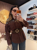 Giacca in camoscio con frange e strass marrone