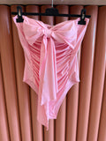 Body con fiocco rosa