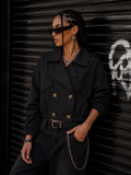 Trench con elastico