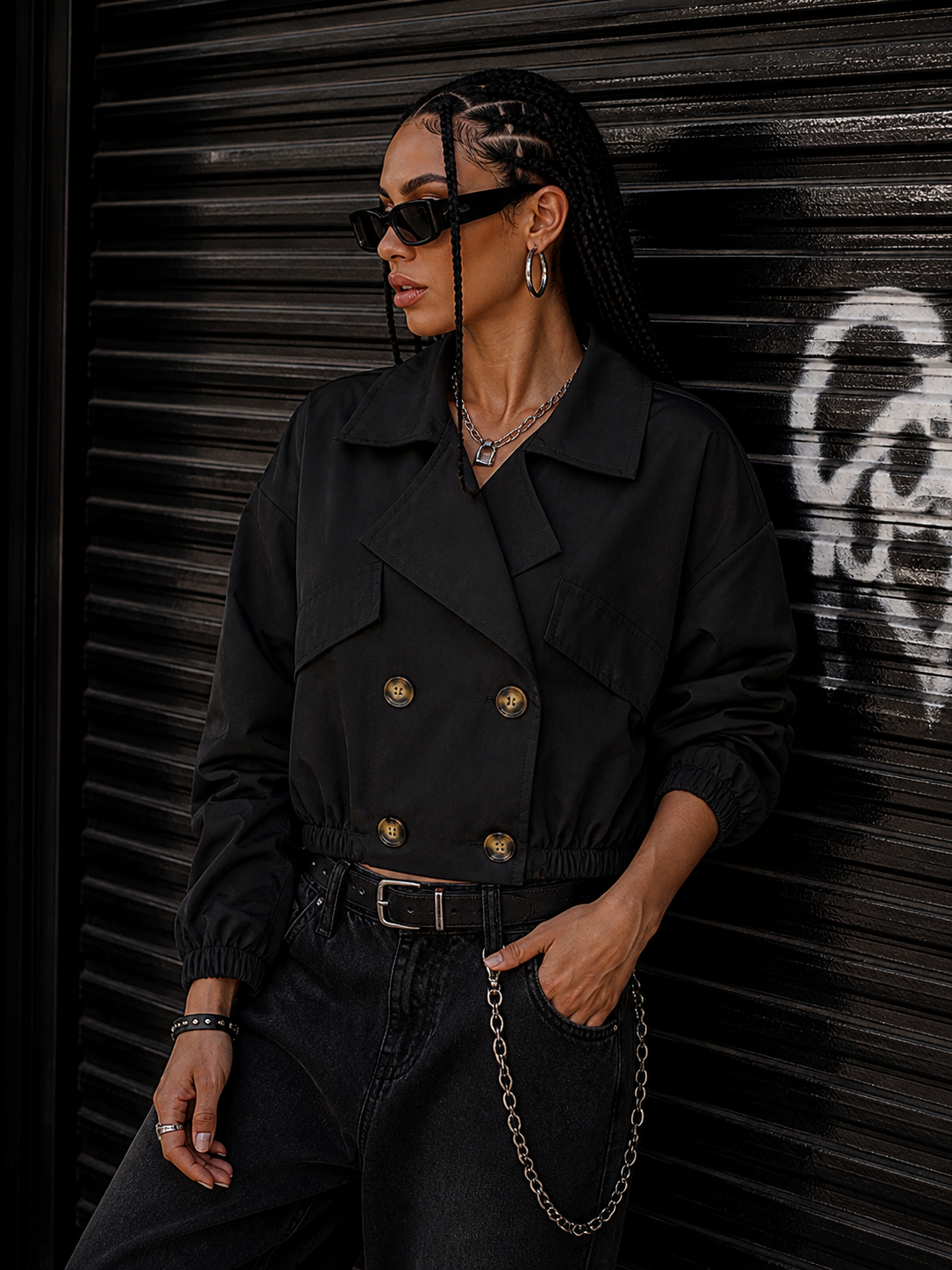 Trench con elastico