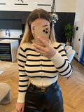 Maglione a righe con zip