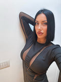 Abito nero con trasparenze