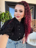 Camicia con fiori ricamati