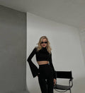 Due pezzi top e pantalone nero