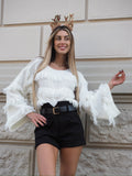 Maglione bianco con frange