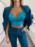 Top con paillettes petrolio