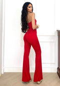 Tuta a fasce rosso con gioielli flame