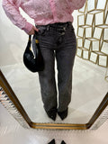 Jeans scuro con strass e risvolto
