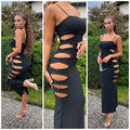Abito in lurex nero con spacchi