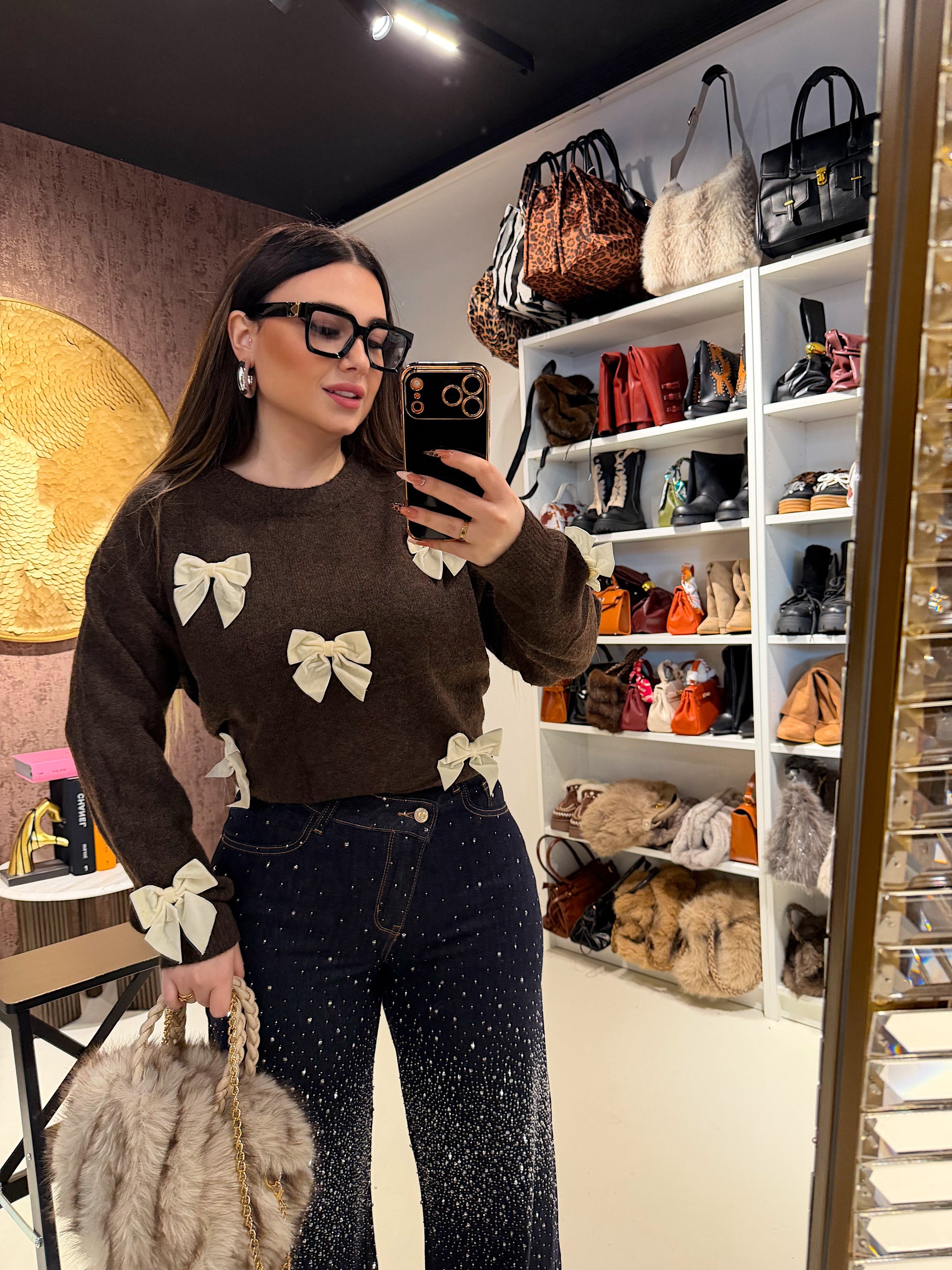 Maglione con fiocchi