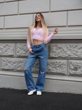 Jeans vita bassa con strappi