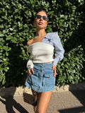 Maglione bianco con scollo e manica in camicia