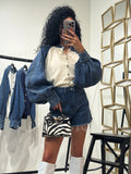 Maglioncino con dettaglio in denim