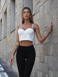 Top bianco con strass argento