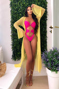 Costume intero con cuore fuxia