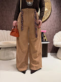 Pantalone in camoscio con cintura in vita