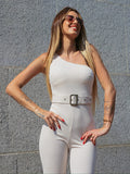 Tuta monospalla beige con cintura