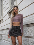 Maglione malva a trecce