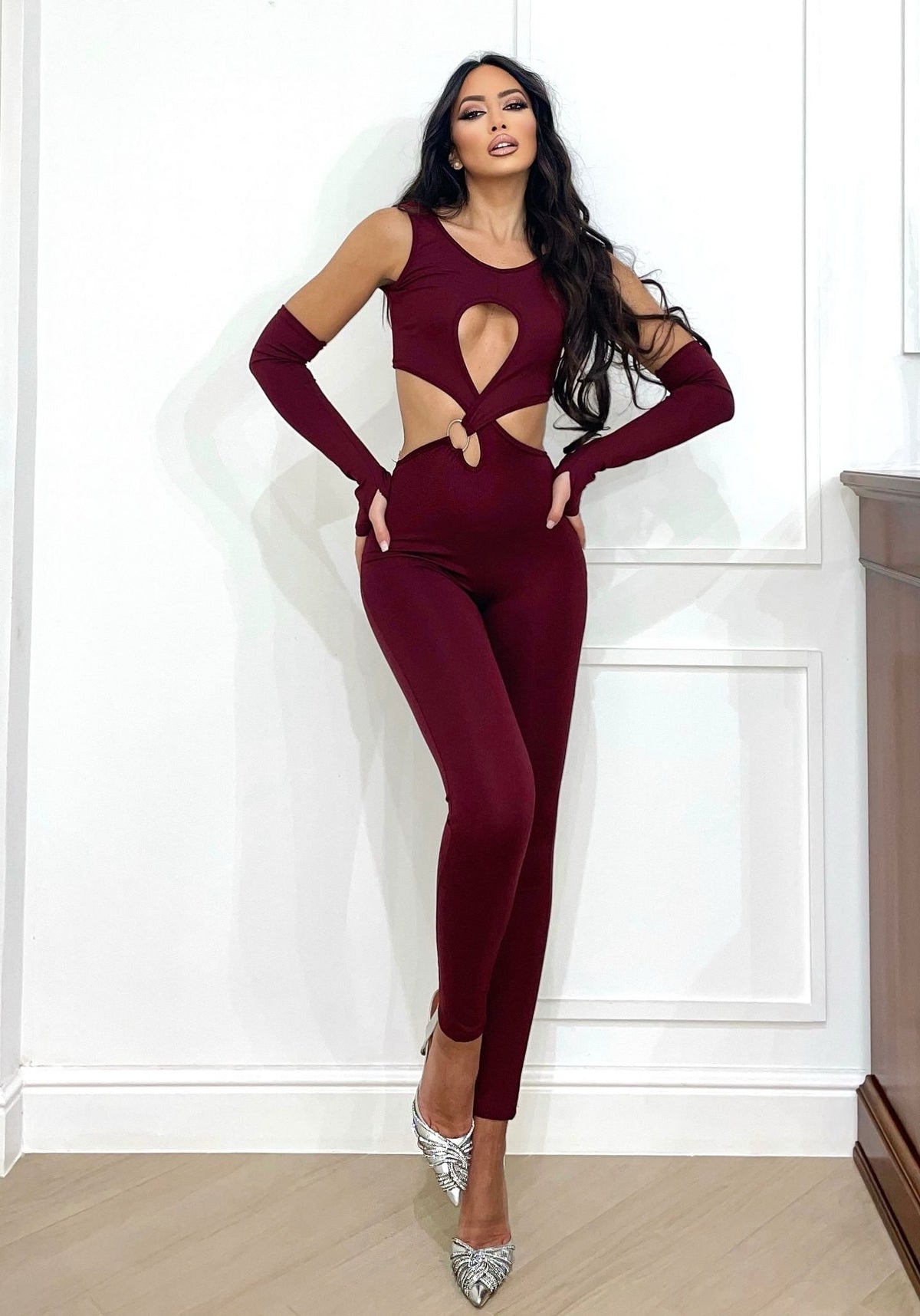 Tuta aderente con incrocio bordeaux