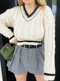 Maglione bianco e nero con strass