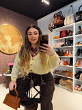 Cardigan giallo con bottoncini oro