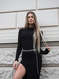 Abito nero a costine con spacco