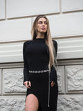 Abito nero a costine con spacco
