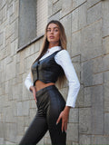 Completo smanicato e pantalone ecopelle