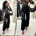 Pantalone in ecopelle con frange