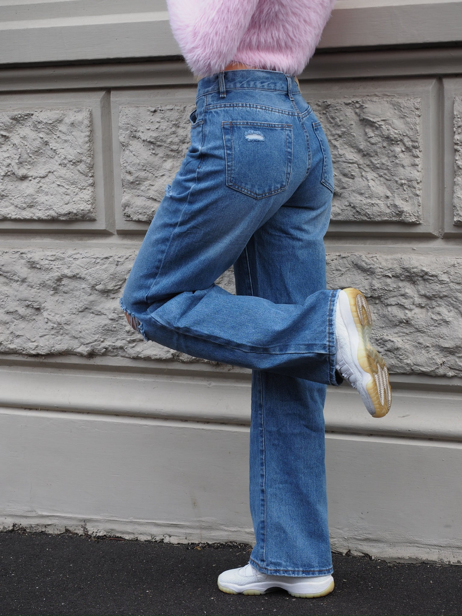 Jeans vita bassa con strappi