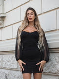Abito nero maniche velate